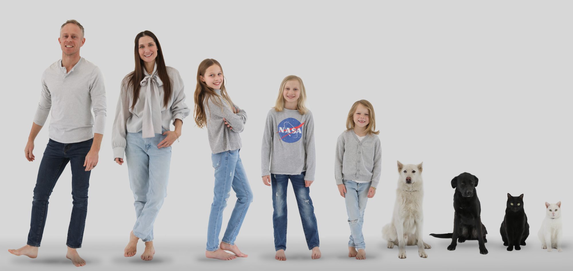 Mark Louzon with his wife, their three children, two dogs and two cats